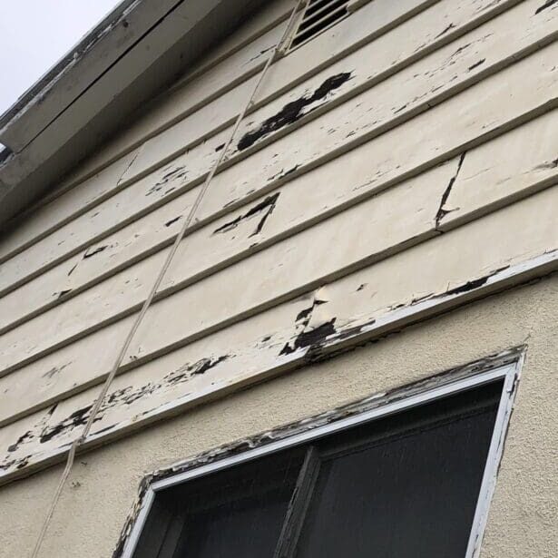 Peeling Paint on Wood Siding.